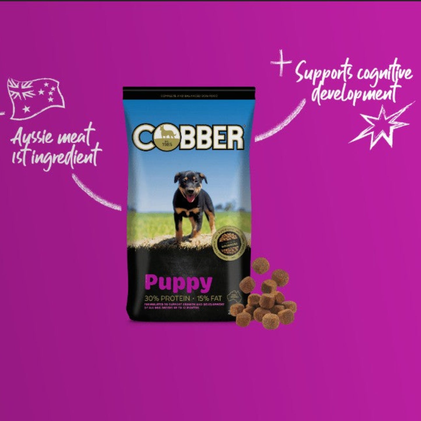 Cobber Puppy dog food package on a purple background with text about ingredients and cognitive development.
