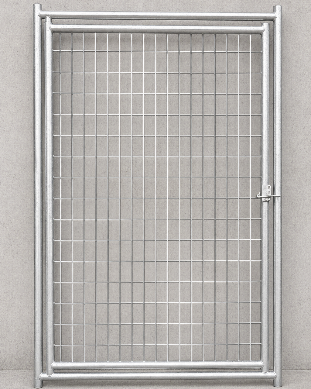 A silver metal wire mesh gate with a rectangular frame and a latch on the right side, set against a neutral gray concrete wall and floor.