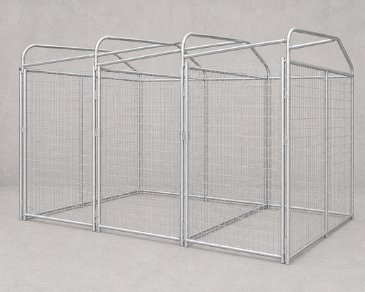 A silver metal wire mesh kennel or dog enclosure with a hipped roof and integrated handle, shown against a neutral gray concrete-textured background.