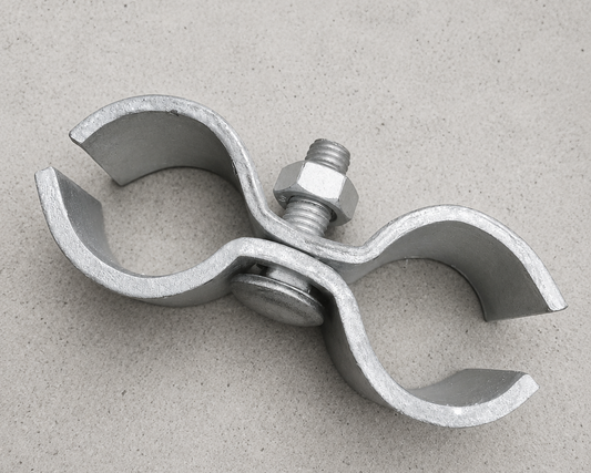A galvanized steel double-bend pipe clamp with a central bolt, nut, and washer, shown on a textured gray background.