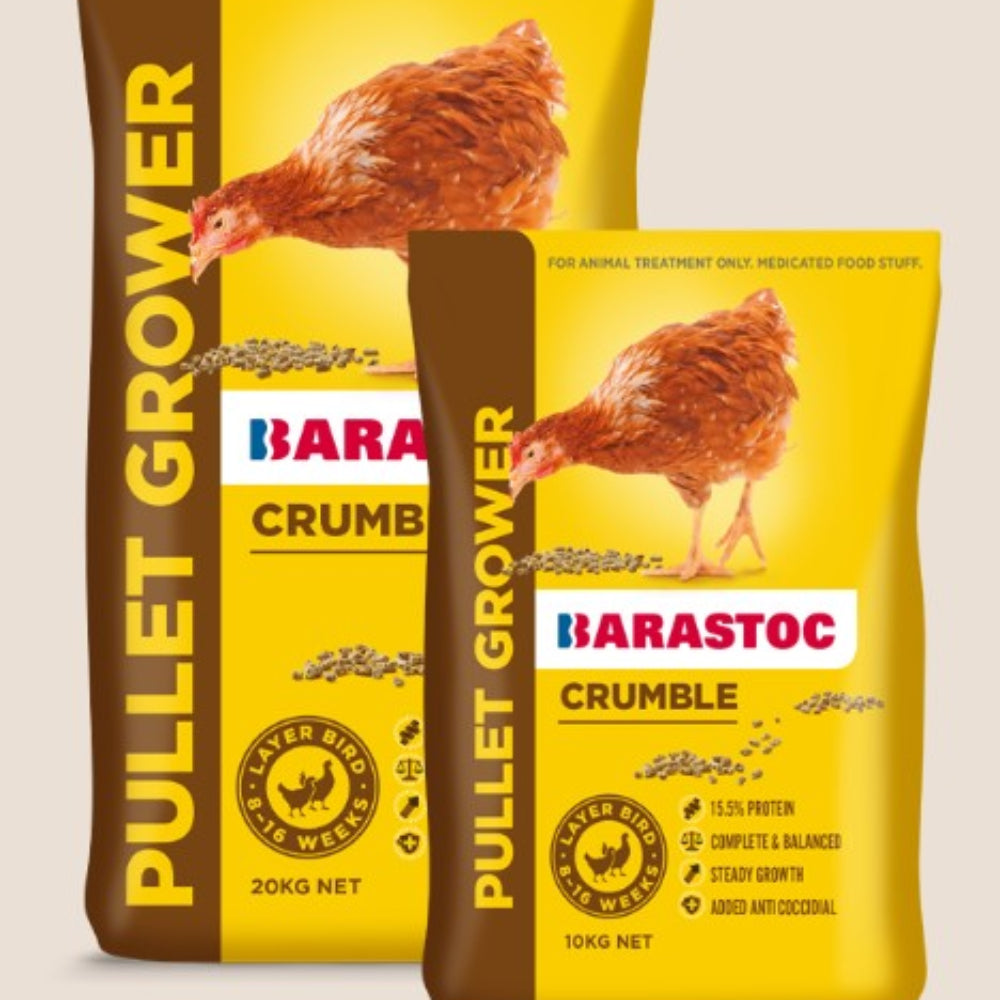 Two packages of Barastoc Pullet Grower Crumble on a beige background